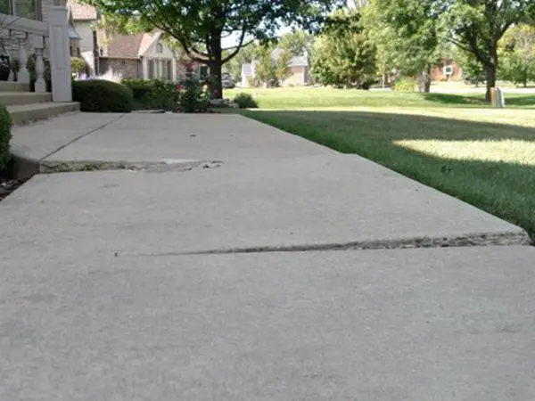 Residential sidewalk leveling before